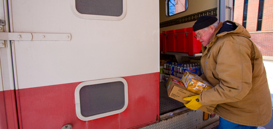 man-loading-truck-with-supplies